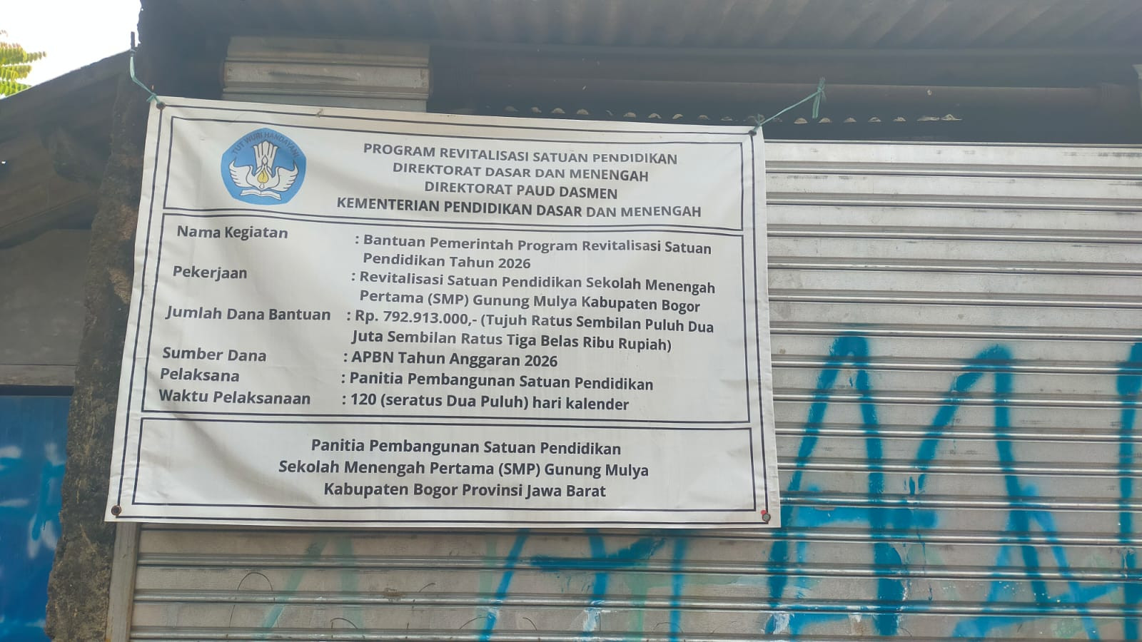 Papan Nama Proyek Bantuan Pemerintah Revitalisasi SMP Gunung Mulya APBN 2026.